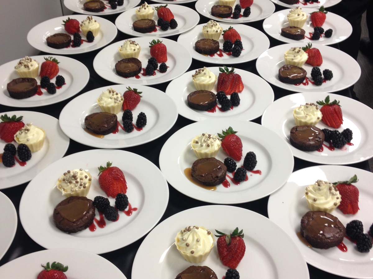 Mini Chocolate Chipotle Cakes with Strawberry Coulis